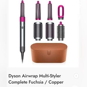 Dyson airwrap fuchsia. Slightly used/ good condition .